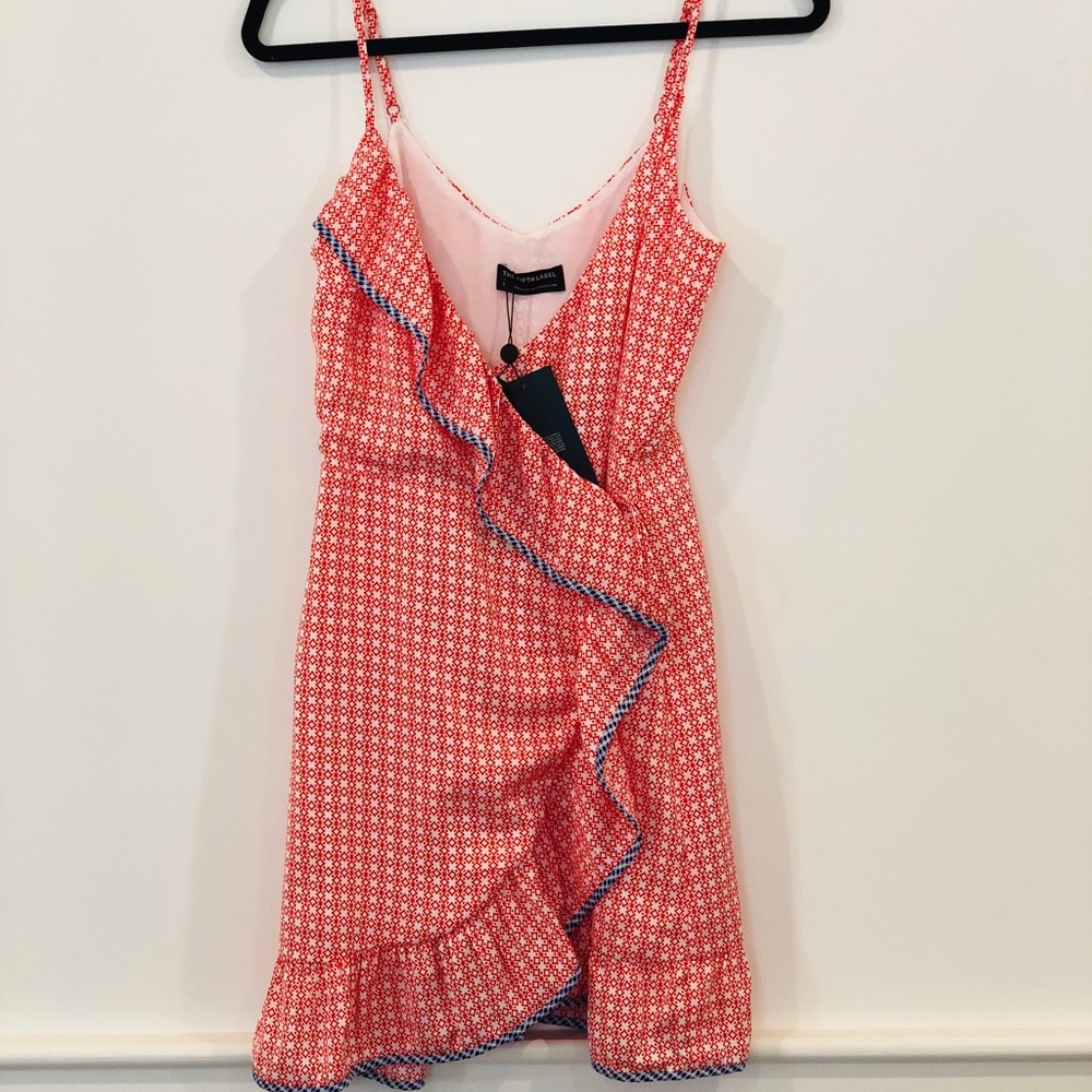 Brand new wrap dress with tags.